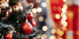 Holiday Happenings A close-up decorated Christmas tree.