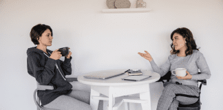 Two women having a conversation.