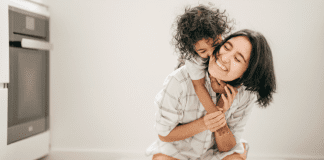 The Next Phase of My Mom Journey A child hugging a mother.