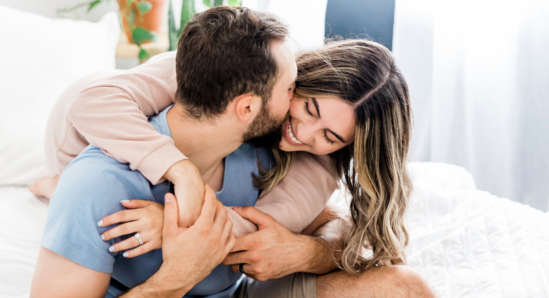 A couple embracing.