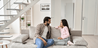 A dad talking to a teen.