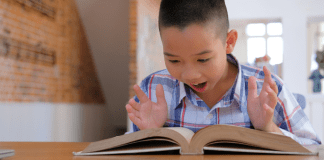 A child excited about reading.