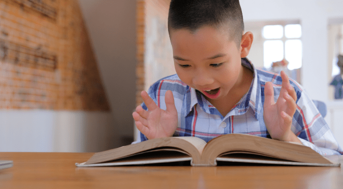A child excited about reading.