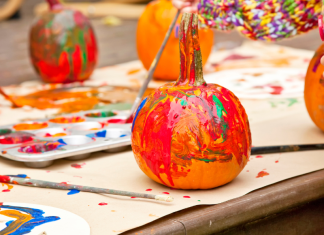 Painting pumpkins for fall.
