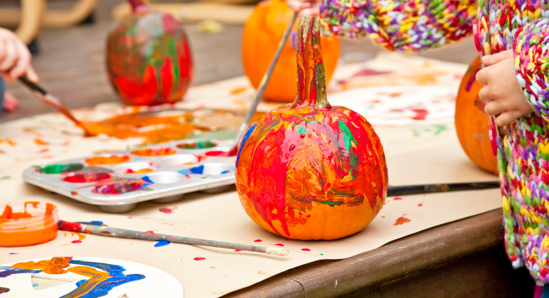 Painting pumpkins for fall.
