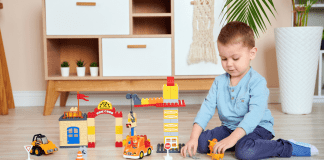 Hot For The Holidays {trendy toys every kid will enjoy} A boy playing with a toy.