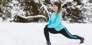 Workout Time: Ways to get in Activity During Cold Months A woman getting ready for a run in the snow.