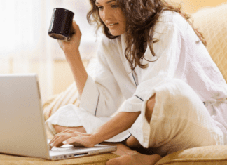A woman on her computer.