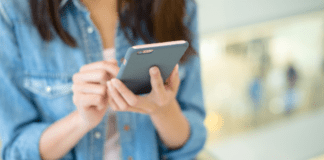 Digital Spring Clean-Up A woman on her cell phone.
