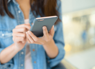 Digital Spring Clean-Up A woman on her cell phone.
