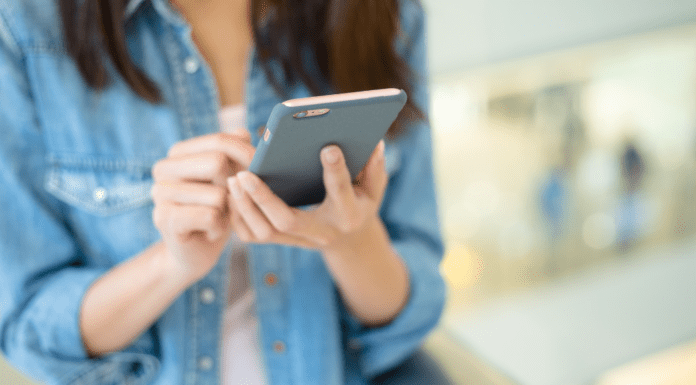Digital Spring Clean-Up A woman on her cell phone.