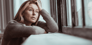 Sex and the Single Mom: #MeToo A woman upset looking out the window.