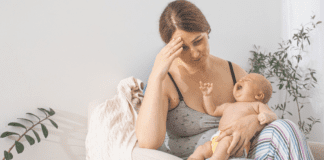 A new mom feeling overwhelmed.