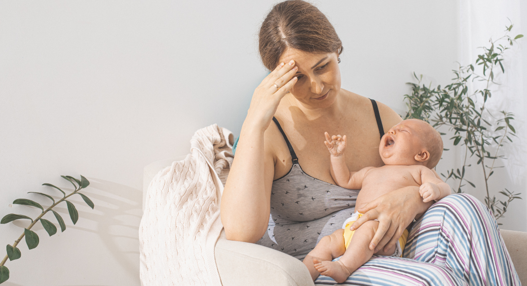 A new mom feeling overwhelmed. 
