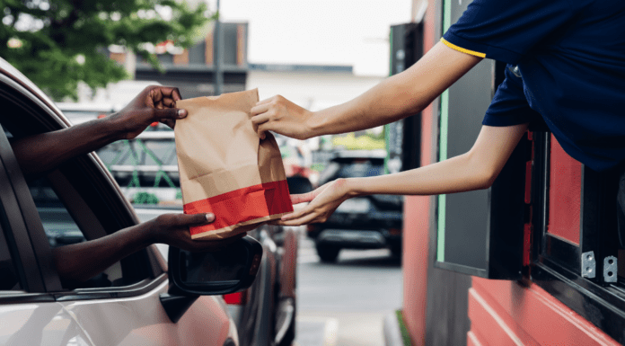 A car going through a drive thru.