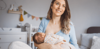 Lactation Boosters: Foods That Help Your Milk Supply A woman breastfeeding her baby.