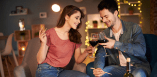 A couple on a date drinking wine.