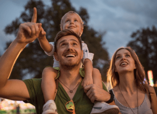 A family at a summer fair.
