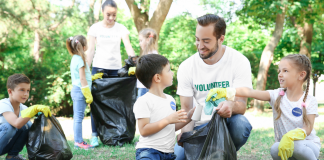 volunteer with young kids