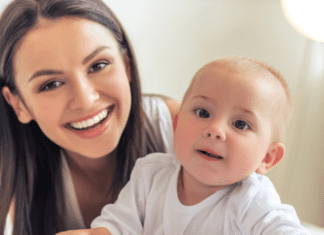 A mother with a baby.