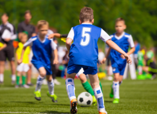 Soccer Mom Hack: Bring the Snack! Kids playing soccer.