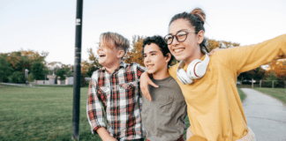 To My Two Eldest Children, In A Year of Transitions Teens walking on a sidewalk.