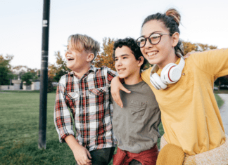 To My Two Eldest Children, In A Year of Transitions Teens walking on a sidewalk.