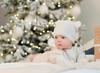 A Christmas baby under the tree.