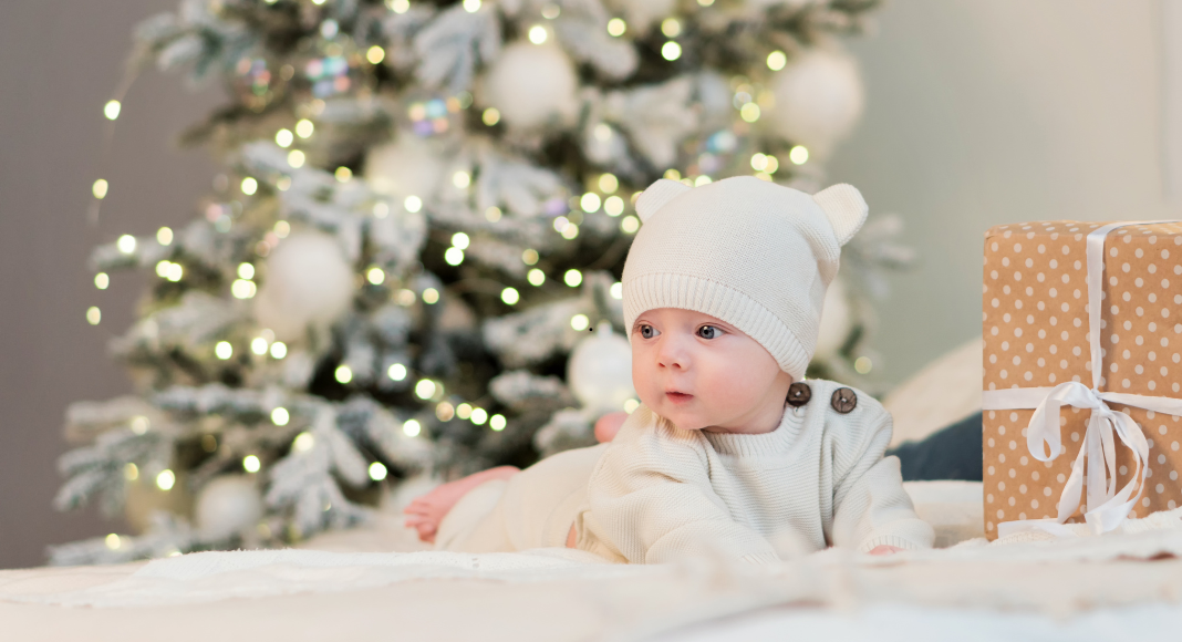 A Christmas baby under the tree. 