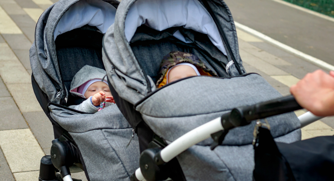 Babies in a double stroller.