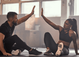 2019 Fitness, Health & Wellness Guide A woman with her fitness coach.