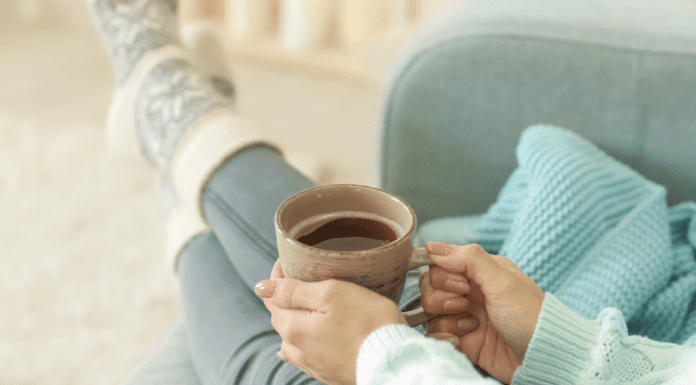 Kicking back and relaxing with a cup of coffee.