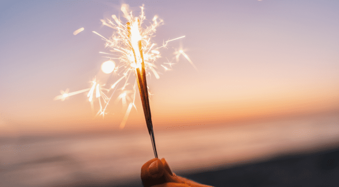 Making wishes on a sparkler.