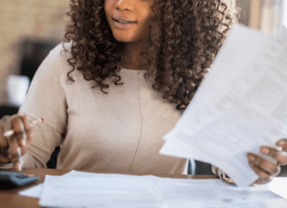A woman looking through her finances and Taxes.
