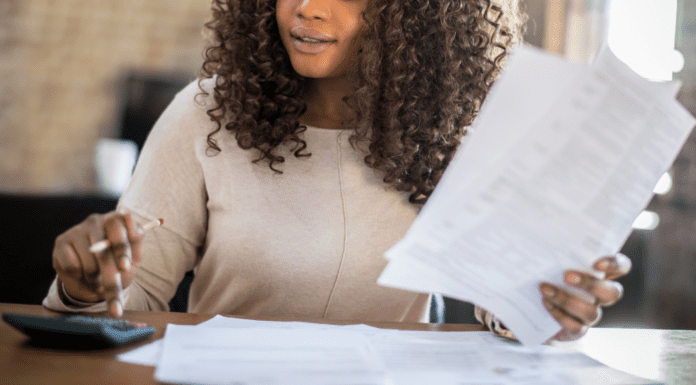 A woman looking through her finances and Taxes.