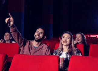 A couple in a theatre.