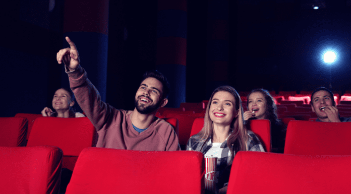 A couple in a theatre.