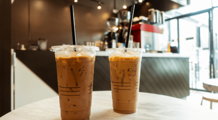 Iced coffees on a table at a coffee house.