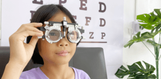 See for Yourself Why Accessible Eye Care Is So Important A girl during an eye exam.