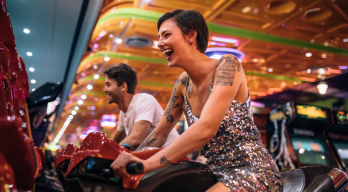 A couple at an arcade.