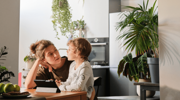 A mother talking to her son.