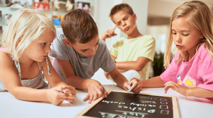 The Power of Behavior Charts KIds filling out a reward chart.