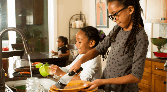 How I Got My Kids to Help with the Housework (and Regained Some of My Sanity) Girls doing chores.