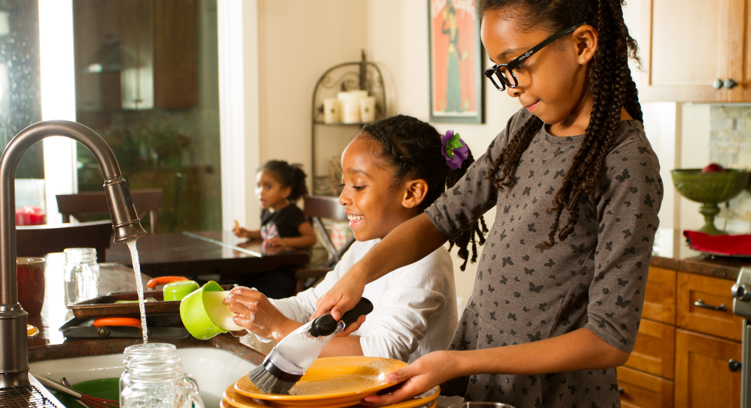 Girls doing chores.