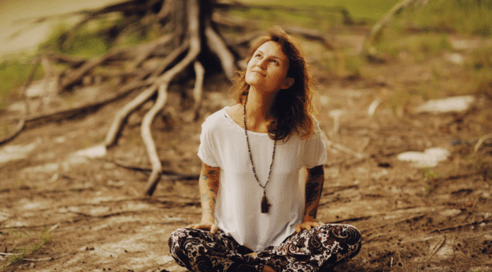 Meet Jordana: Growing Roots A woman sitting next to roots.