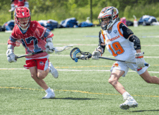 Boys playing lacrosse.