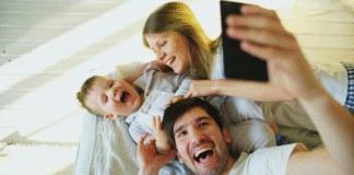 Smile! It’s Selfie Day! A family taking a selfie.