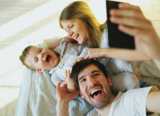 Smile! It’s Selfie Day! A family taking a selfie.