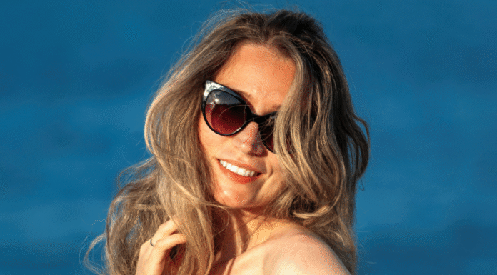Sunglasses: The Top 5 Reals and Steals A woman wearing sunglasses.