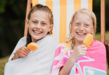 Taking a Summer Vacation From the Digital World Two girls eating popsicles.